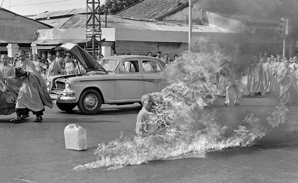 FILE - In this June 11, 1963 file photo, one of a series taken by then AP Saigon correspondent Malcom Browne, Thich Quang Duc, a Buddhist monk, burns himself to death on a Saigon street to protest alleged persecution of Buddhists by the South Vietnamese government. Browne, acclaimed for his trenchant reporting of the Vietnam War and a photo of a Buddhist monk's suicide by fire that shocked the Kennedy White House into a critical policy re-evaluation, died Monday night, Aug. 27, 2012 at a hospital in New Hampshire, not far from his home in Thetford, Vt. He was 81. (AP Photo/Malcolm Browne)/NYMB108/570742492506/ JUNE 11, 1963 FILE PHOTO/1208281826