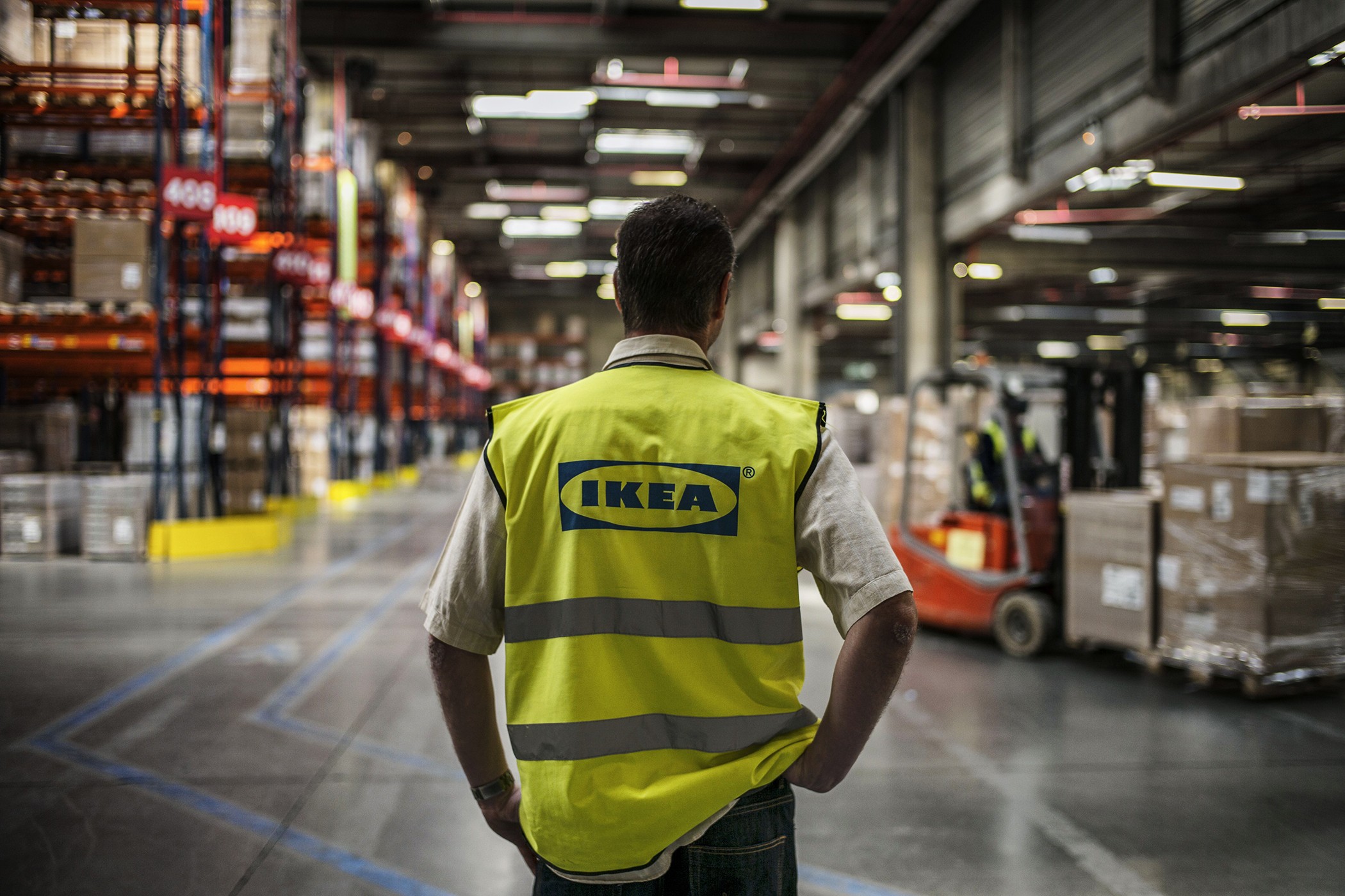 An employee is at work at a warehouse of world's largest furniture retailer Ikea, on March 18, 2014 in Saint-Quentin-Fallavier. AFP PHOTO / JEFF PACHOUD (Photo credit should read JEFF PACHOUD/AFP/Getty Images)