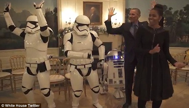 33DCF04E00000578-0-The_Obamas_danced_with_two_stormtroopers_to_the_tune_of_Uptown_F-a-49_1462445586829